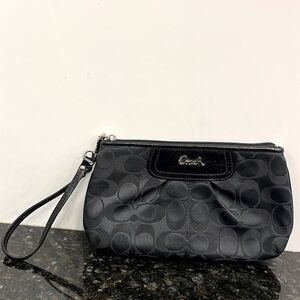 Coach wristlet -Black. Size 9” x 5.5”
